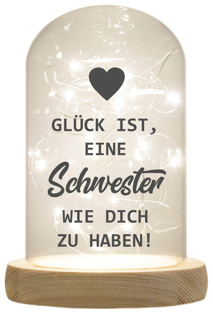 LED-Glaskuppel, Glück ist eine Schwester wie dich zu haben, 16,5x11cm, Glasglocke mit LED-Licht und Holz-Fuß LED-Laterne LED-Lampe mit Text Spruch