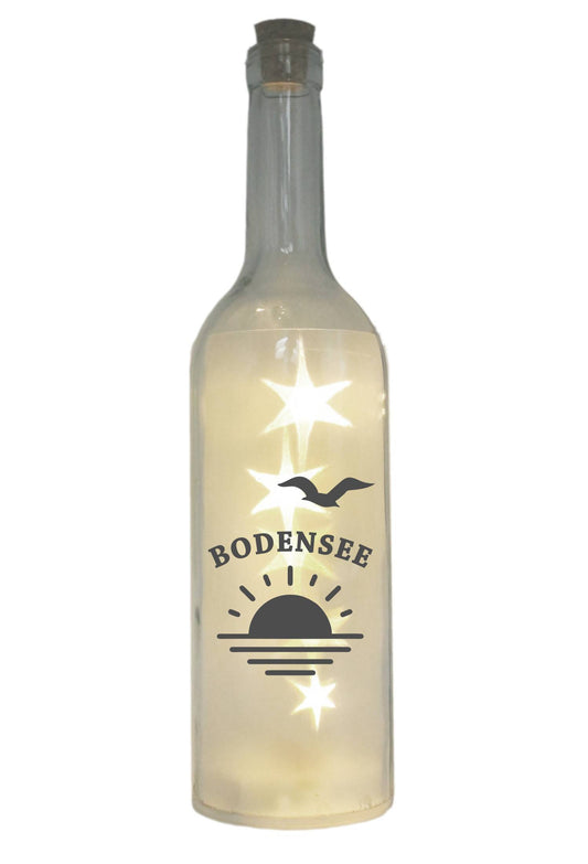 LED-Flasche mit Motiv, Bodensee Sonne Sonnenuntergang Möwe, grau, 29cm, Flaschen-Licht Lampe mit Text Spruch